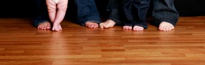 Bare feet on a hardwood floor